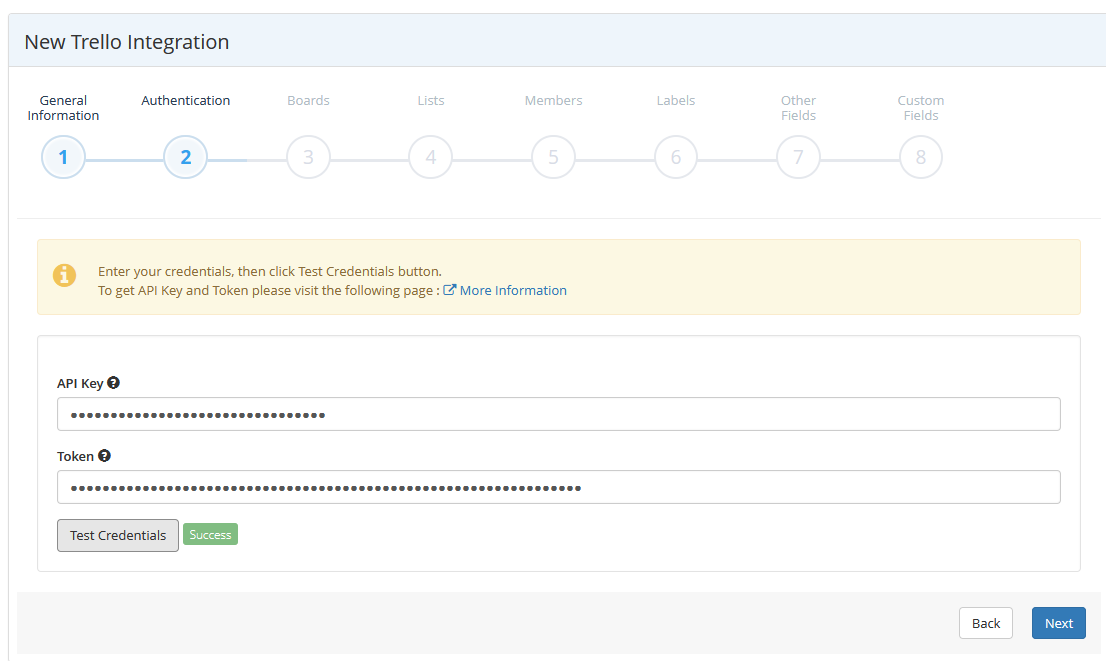 Trello integration wizard Authentication step showing API Key and Token fields with Test Credentials button