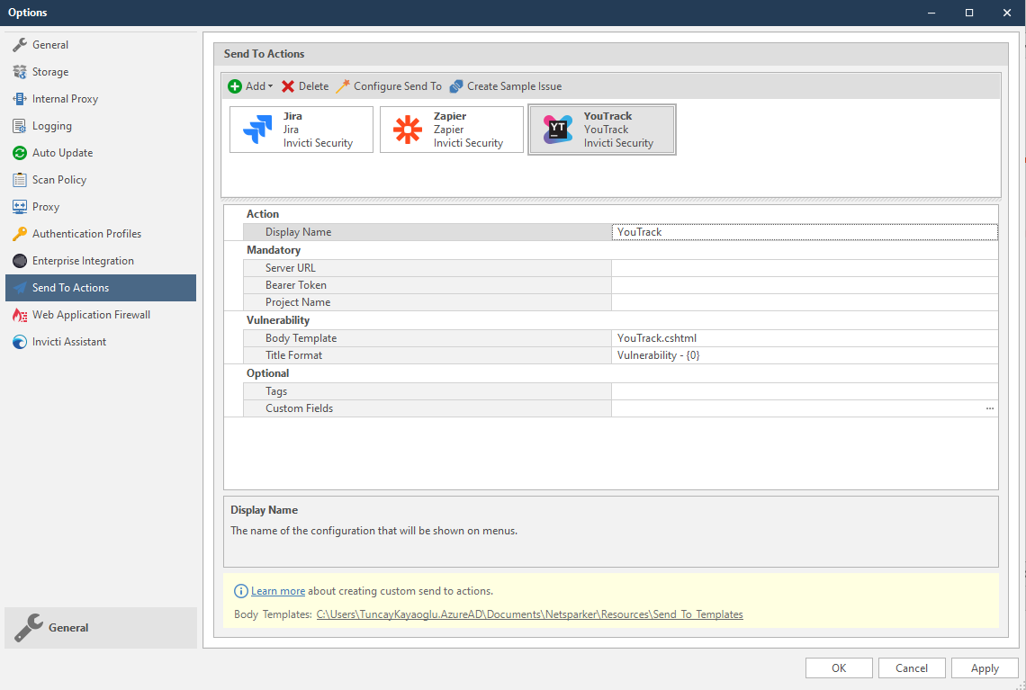 YouTrack test connection dialog showing Create Sample Issue confirmation and results